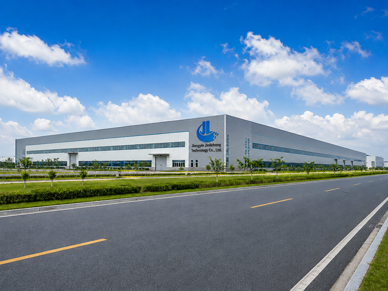 Jinlicheng Technology factory exterior under blue sky